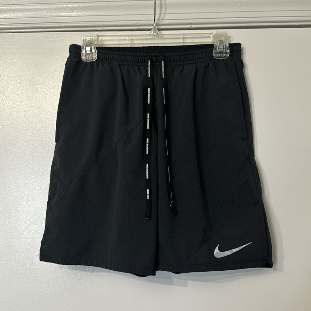 Nike Dri-fit 7” lined running shorts size medium. Great condition!